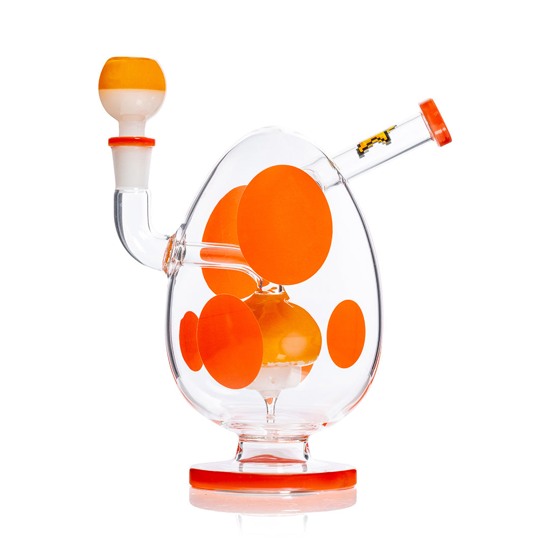 HEMPER Spotted Egg XL Bong, 9-inch orange waterpipe with spotted design, side view showing glass mouthpiece and base.