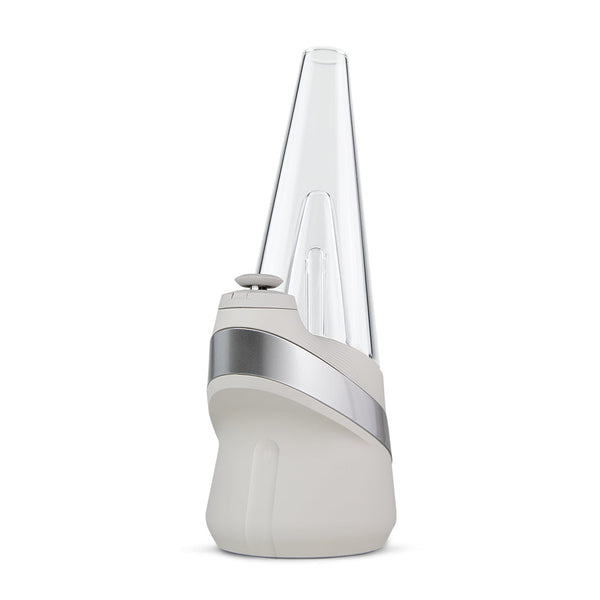 Puffco New Peak Vaporizer emitting a cloud of vapor, showcasing its sleek design and vapor production.
