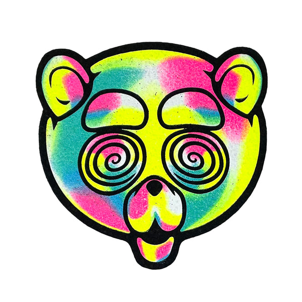 Mood Mats Heady UV Teddy coaster featuring a vibrant UV-reactive design on a colorful, textured coaster surface.