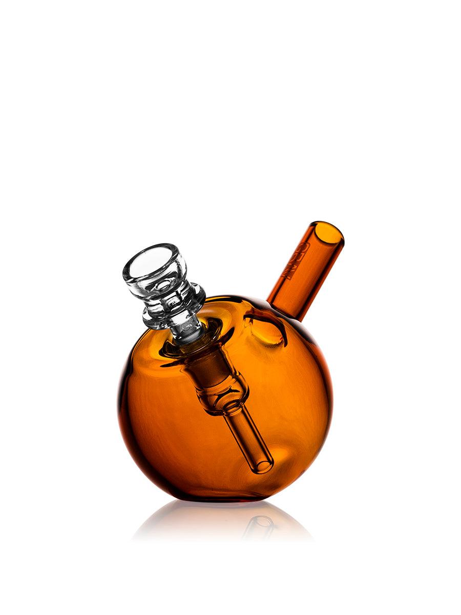 GRAV Spherical Pocket Bubbler in light cobalt color, compact glass smoking bubbler with rounded shape and assorted vibrant colors.