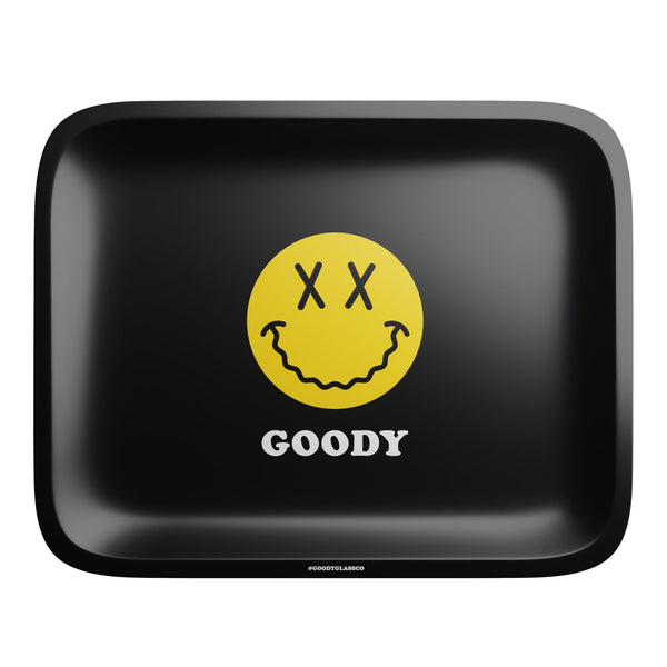 Black Goody Glass rolling tray with a large face design, featuring a sleek rectangular shape and raised edges for smoking accessories.