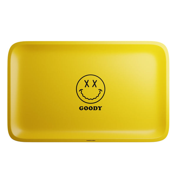 Yellow Goody Glass rolling tray with big face design, featuring Smoke Drop branding and a vibrant, durable surface for rolling accessories.