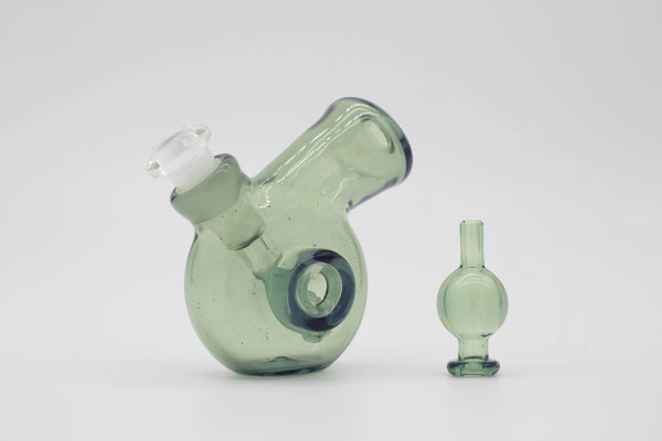 East Atlanta S&V Brett Andrews Glass Turbo Travel Rig (Potion) for smoking, featuring a sleek glass design and portable size.