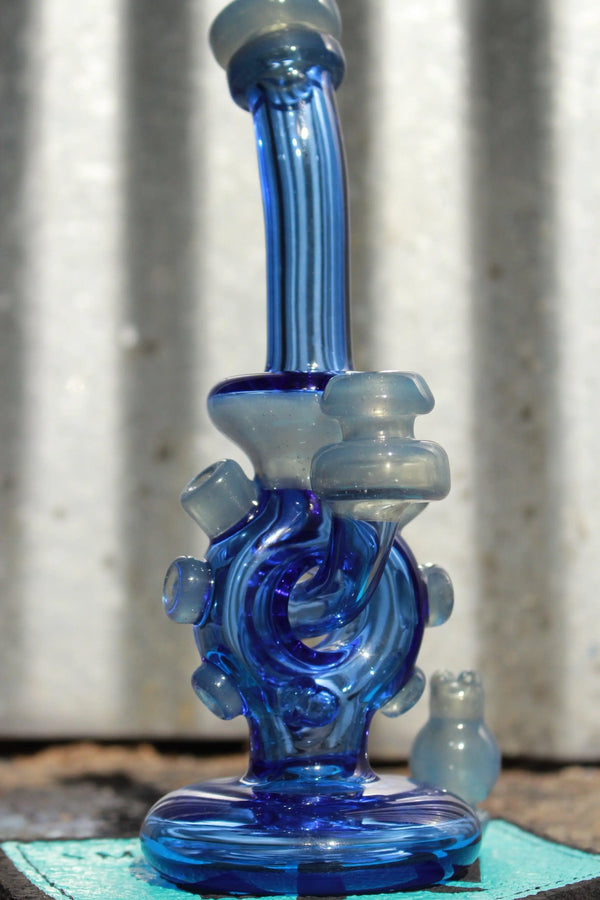 EAV Smoke & Vape Kevlar Glass Water Pipe #37 in Blue Dream and Pastel Potion colors, showcasing intricate design and clear glass craftsmanship.