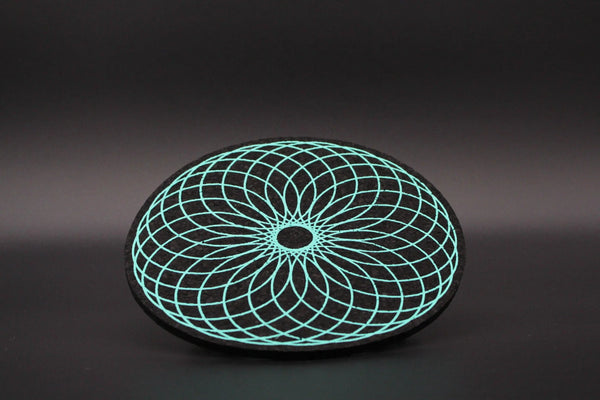 Moodmats x Aquamarine Torus smoke accessory with intricate design, made by Moodmats, featuring a vibrant aquamarine color.