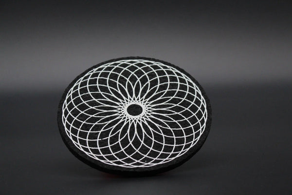 Moodmats Cosmic Torus smoke accessory featuring a colorful, psychedelic design on a round mat for smoking sessions.