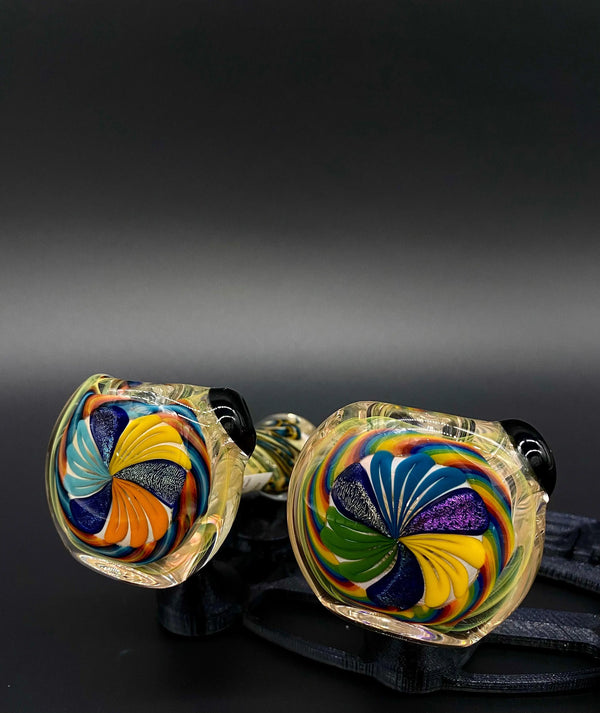 Talent Glass Works Inc three dichro petal glass pipe with colorful petal design and intricate glass craftsmanship.