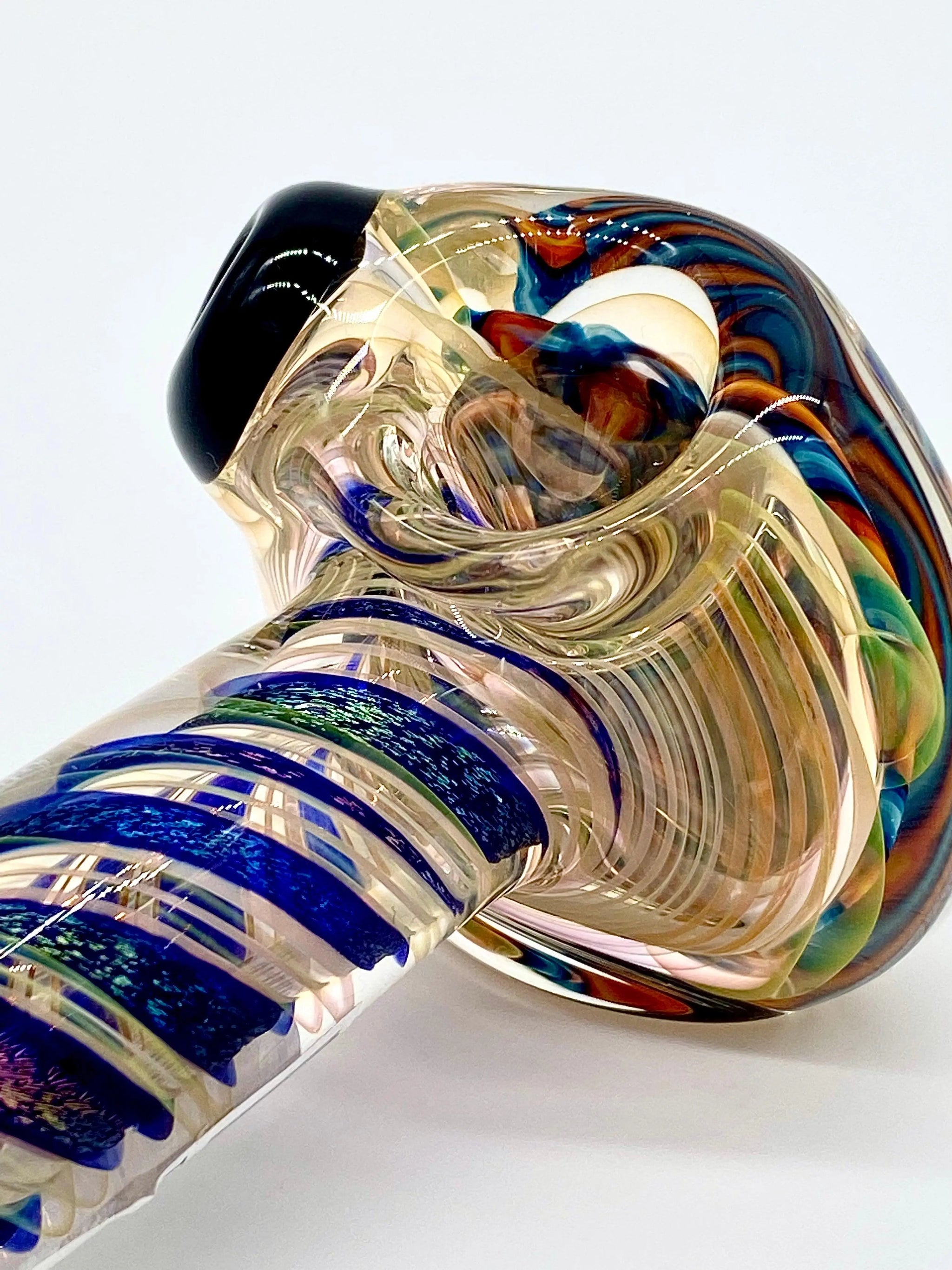 Talent Glass Works Inc color coil glass pipe with a coiled design, showcasing vibrant glass art and craftsmanship.