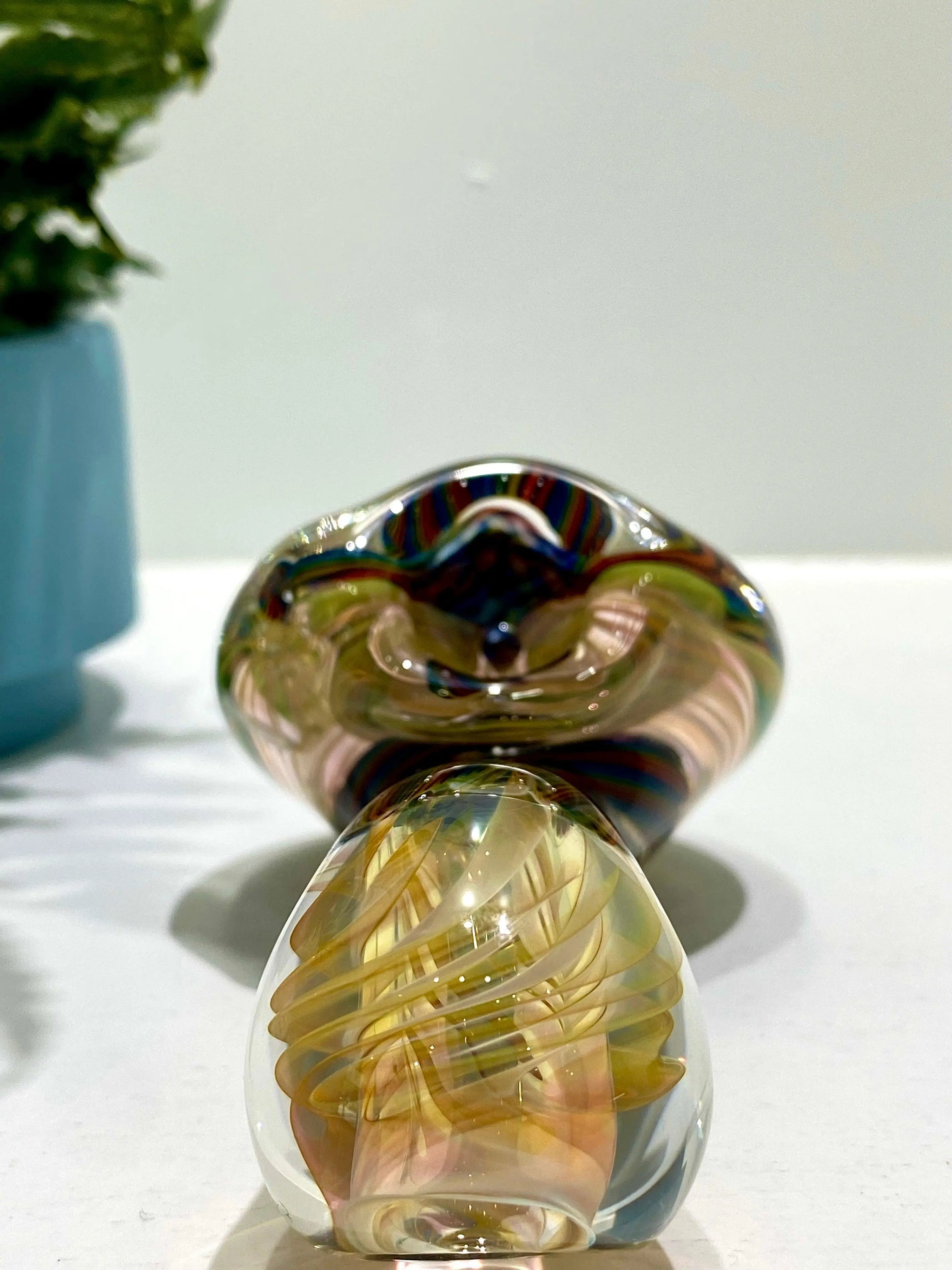 Color coil Sherlock glass pipe by Talent Glass Works Inc featuring a vibrant spiral design and clear glass details.