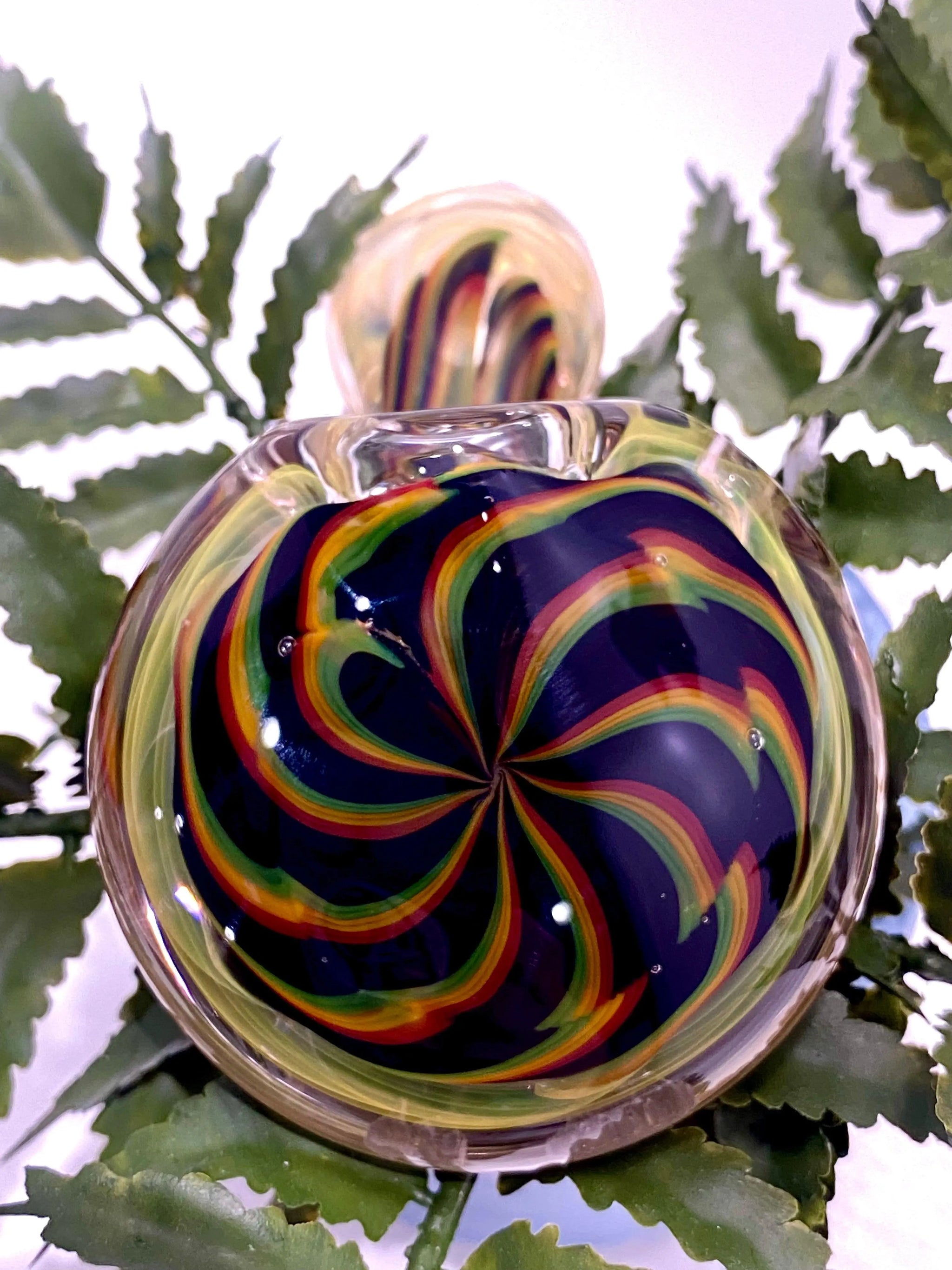 Color coil Sherlock glass pipe by Talent Glass Works Inc, featuring vibrant glass design and a classic smoking pipe shape.